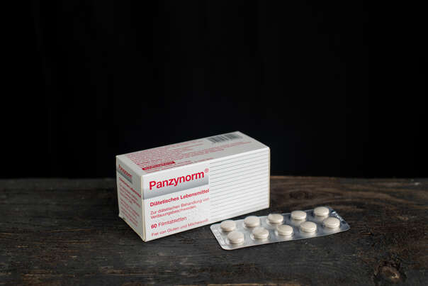 Sie sehen eine Packung Panzynorm Filmtabletten, Produktbild: 02 Panzynorm Filmtabletten, A-Nr.: 4020910 - 02